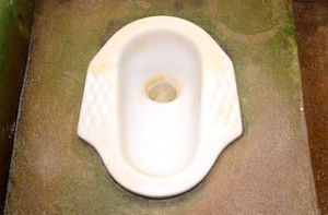 Dirty Squat toilet.